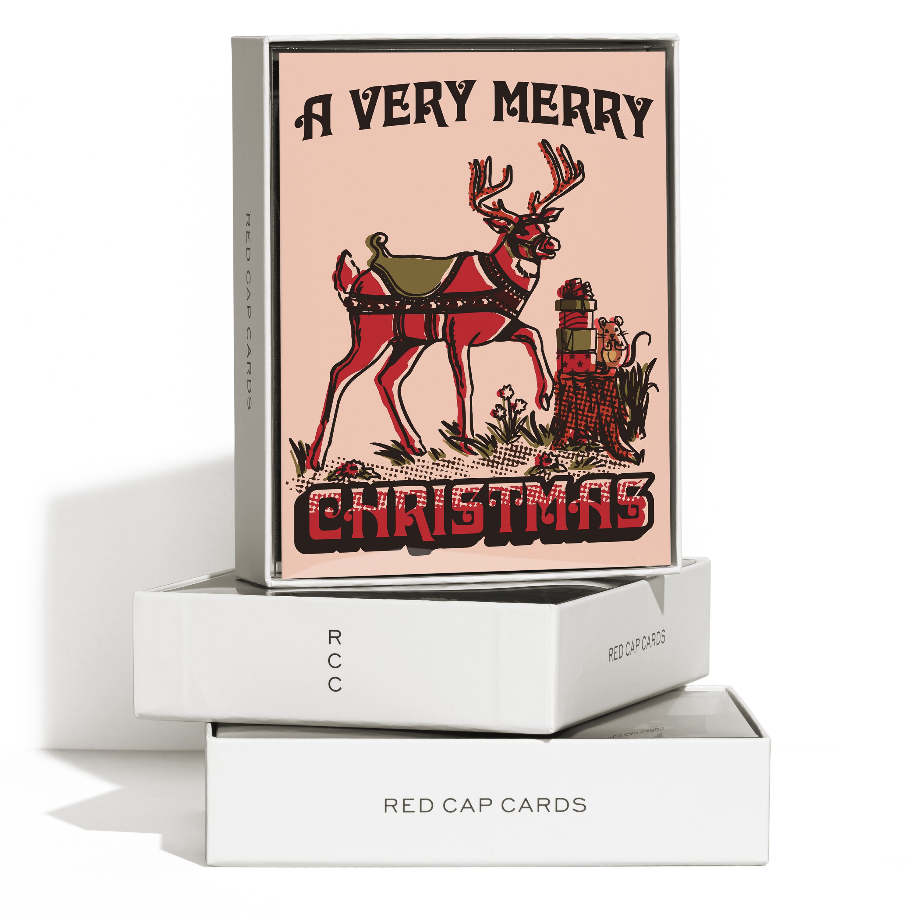 Boxed set of 8 Christmas cards with cartoon reindeer and mouse on tree stump with presents and 'A Very Merry Christmas' text.